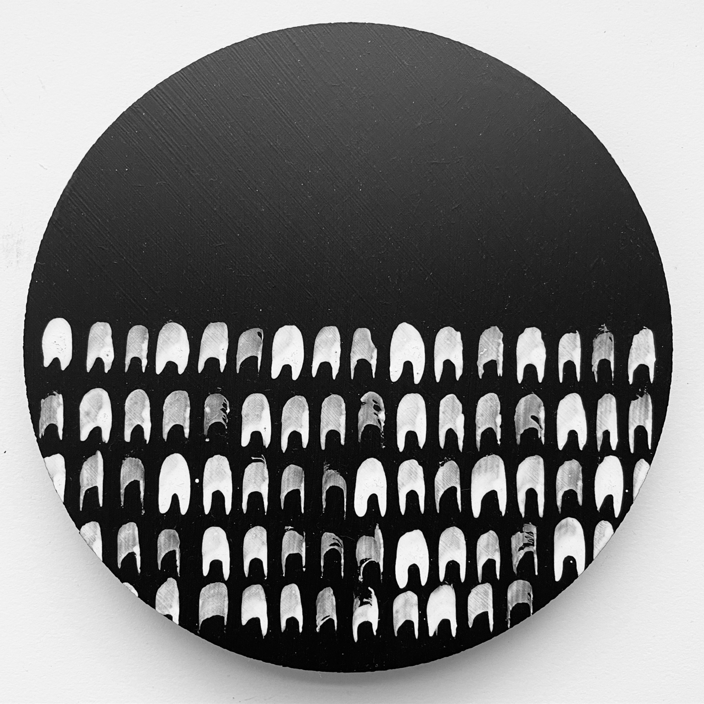 Rondo series drawing six inch MDF round, black background with ink marks