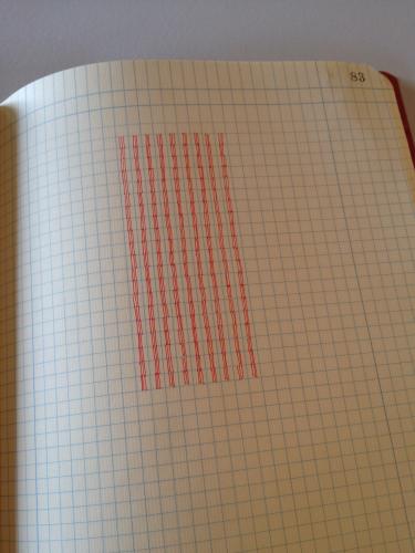 A drawing by Stella Untalan in a computation book with ink three lines 