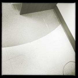 square, digital photographic image, warm toned black and white